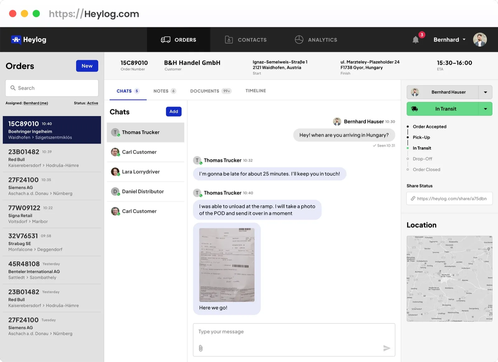 Heylog in the browser: the order list on the left, a driver chat with a photo of the freight papers in the middle, trip status and location on the right